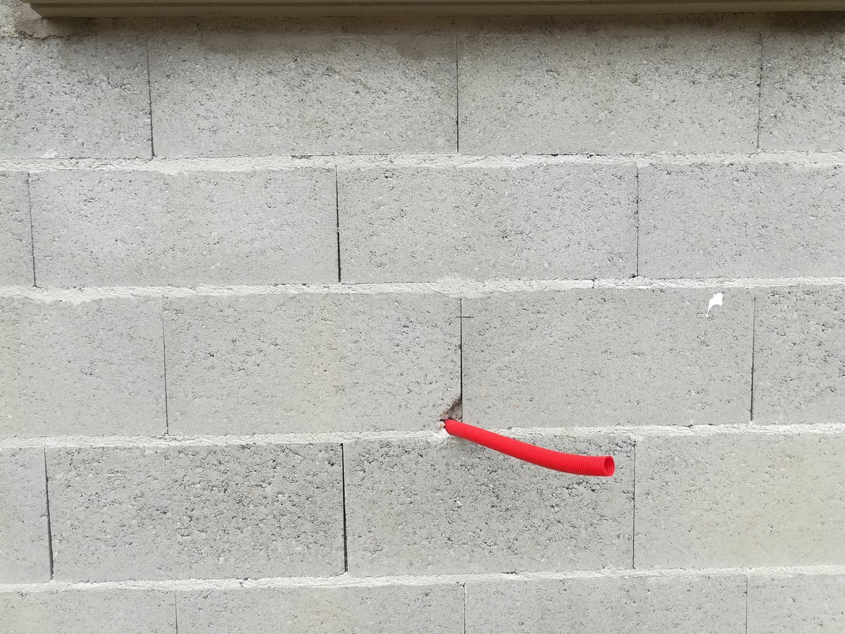 Réaliser une sortie murale pour robinet de jardin